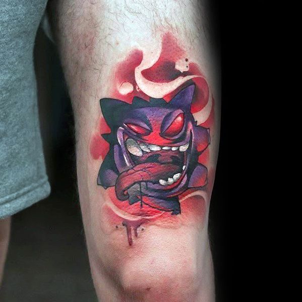 Fierce Gengar tattoo with glowing red eyes, wild expression, and extended tongue, surrounded by intense red and white smoky effects.