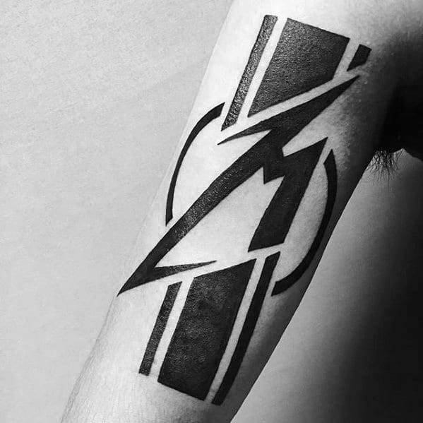 Bold geometric tattoo of the Metallica M logo integrated with sharp lines and abstract shapes for a modern, striking design.