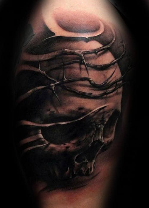Gentleman With 3d Tattoo Of Thorns And Skull Arm Upper Arm