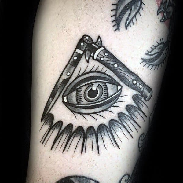 Gentleman With All Seeing Eye Switchblade Tattoo On Arm
