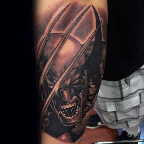 Gentleman With Arm Tattoo Of Shaded Wolverine Design