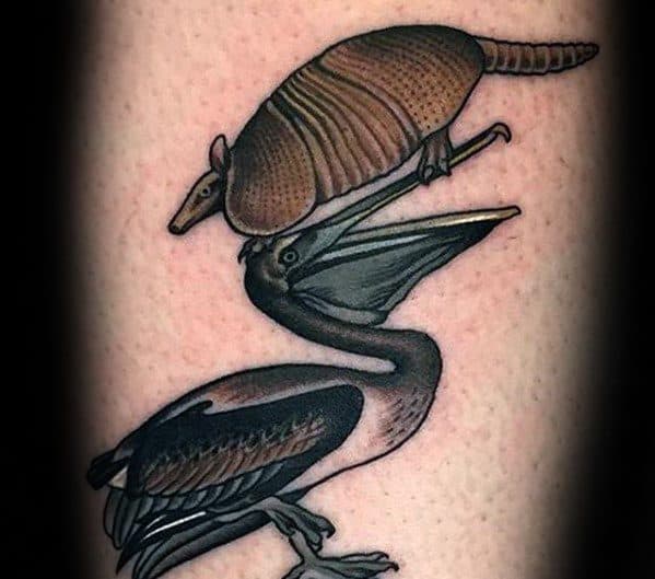 Gentleman With Armadillo Pelican Thigh Tattoo