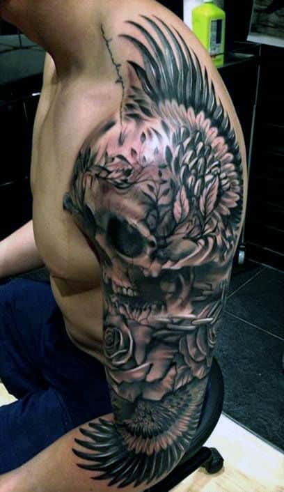 Gentleman With Awesome Skull Tattoos Full Sleeve Design With Wings