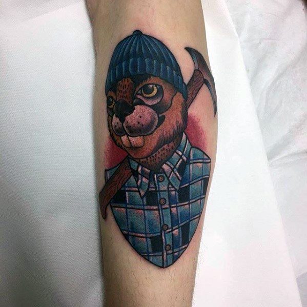 Beaver tattoo dressed as a lumberjack with blue plaid shirt and beanie, holding an axe over the shoulder in a bold cartoon style.