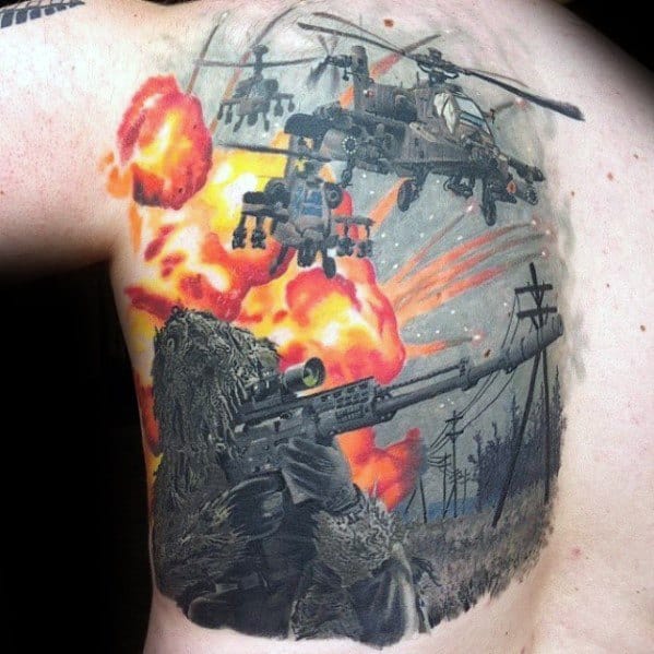 Realistic Call of Duty sniper tattoo on the shoulder, featuring a ghillie suit marksman, attack helicopters, and fiery explosions in vivid detail.