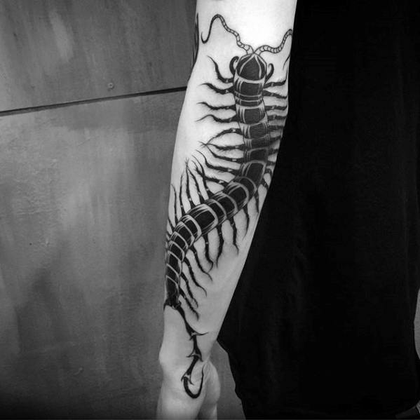 Gentleman With Centipede Tattoo On Outer Forearm