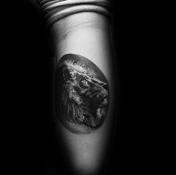 Gentleman With Circular Leg Calf Lion Head Tattoo