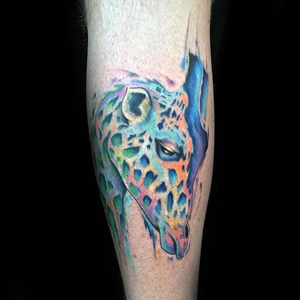 Gentleman With Colorful Giraffe Watercolor Tattoo On Leg Calf
