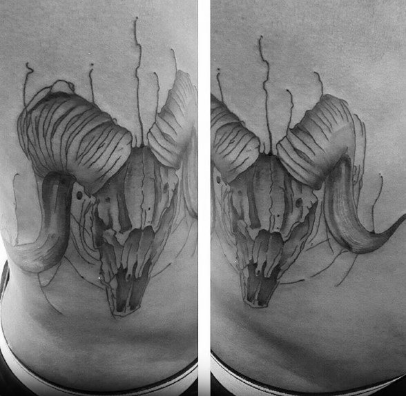 Gentleman With Cool Aries Ram Skull Tattoo On Rib Cage Side