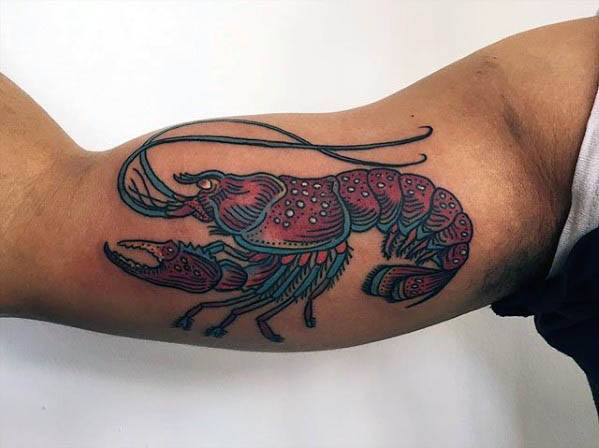 Gentleman With Crawfish Tattoo On Inner Arm Bicep
