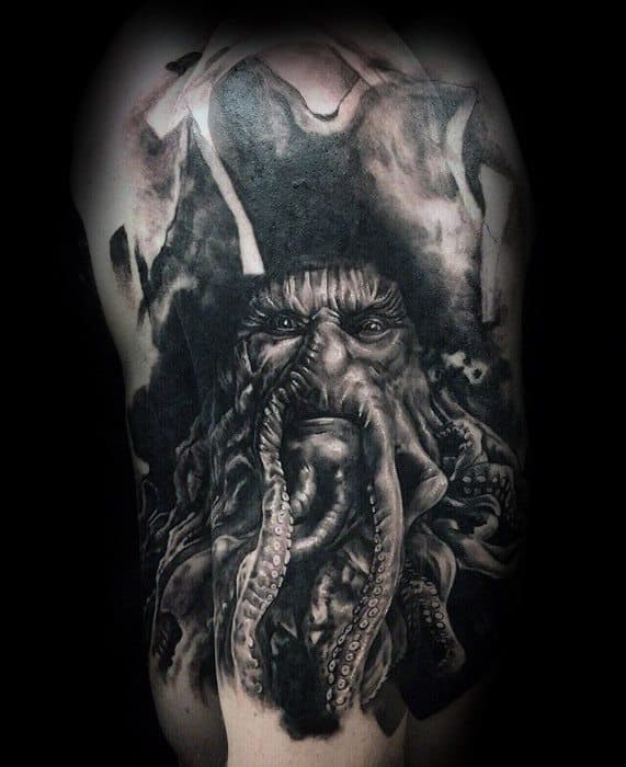 Black and gray tattoo of a pirate resembling Davy Jones with an octopus-like face