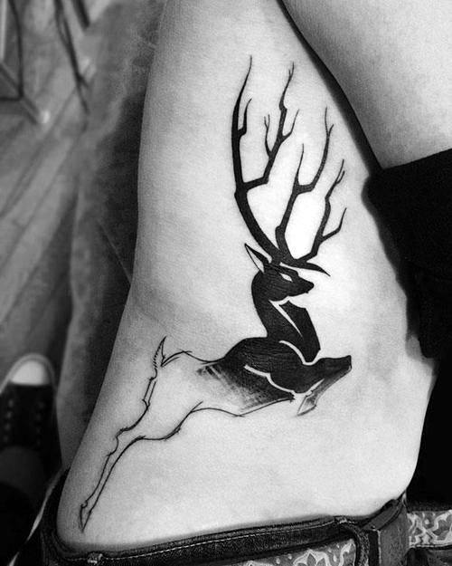 Gentleman With Faded Deer Unusual Rib Cage Side Tattoo Design