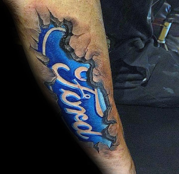 Ford logo tattoo on forearm with a ripped-skin effect, featuring a bold blue emblem and realistic torn flesh detailing for a 3D look.