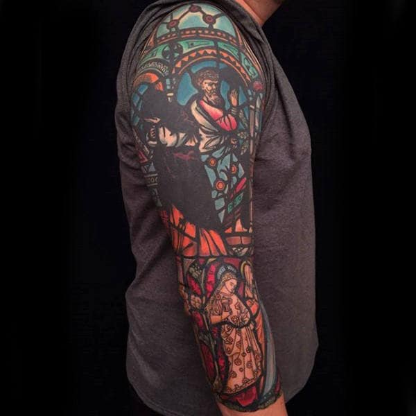 Gentleman With Full Arm Sleeve Tattoo Of Stained Glass Window Design