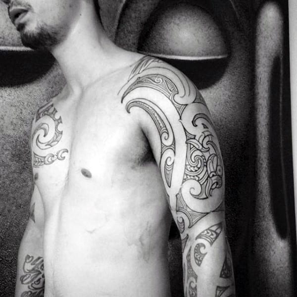 Gentleman With Full Maori Themed Tattoo Sleeve