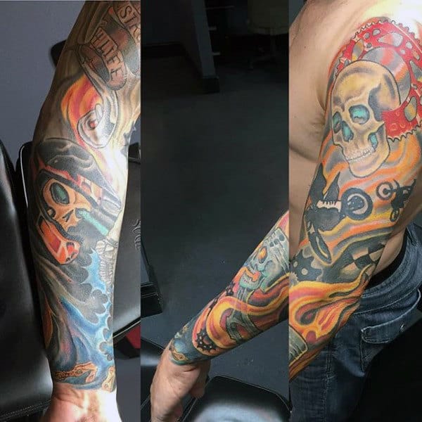Gentleman With Full Sleeve Motocross Themed Tattoo On Arm