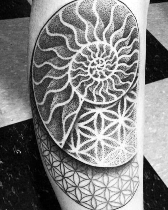 Gentleman With Geometric Flower Of Life Pattern Leg Ammonite Tattoo