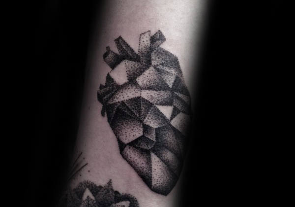 Gentleman With Heavy Dotwork Geometric Heart Tattoo On Inner Forearm
