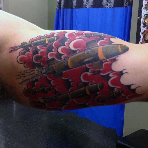 Gentleman With Hellfire Missile Bicep Quarter Sleeve Tattoo