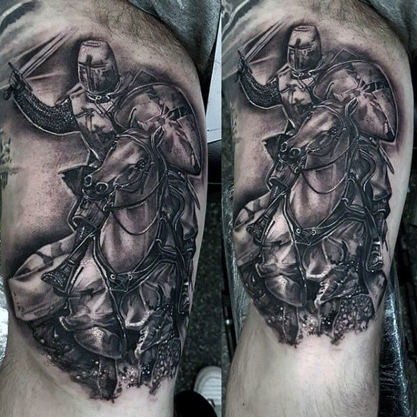 Realistic black and grey tattoo of an armored knight charging on horseback, with dramatic shading and battlefield detail