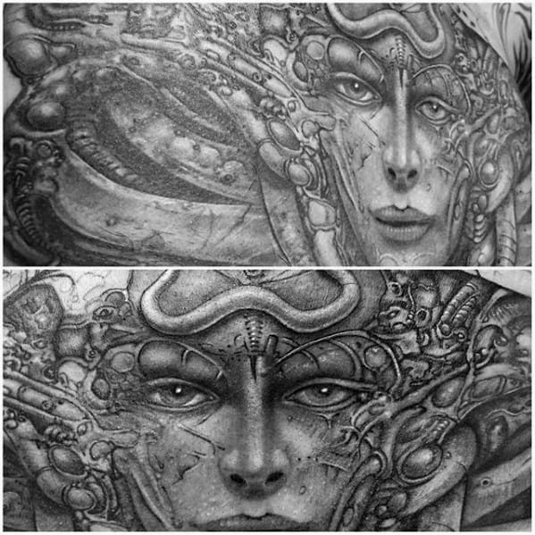 HR Giger-inspired tattoo featuring detailed biomechanical female faces fused with wires, tubes, and surreal alien elements.