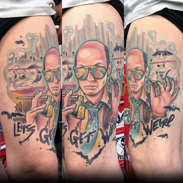 Colorful Hunter S. Thompson tattoo featuring aviator glasses, a psychedelic desert scene, and "Let's Get Weird" text with surreal elements.