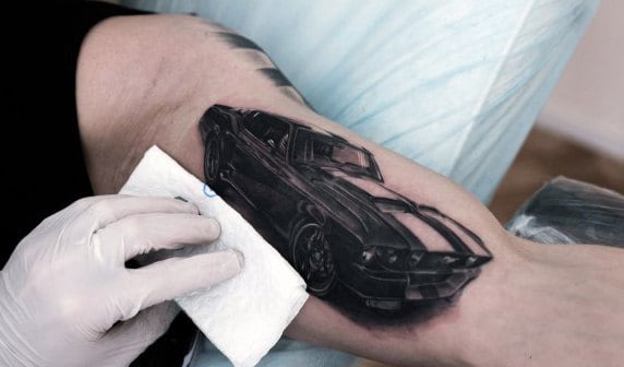 Gentleman With Inner Bicep Mustang Tattoo
