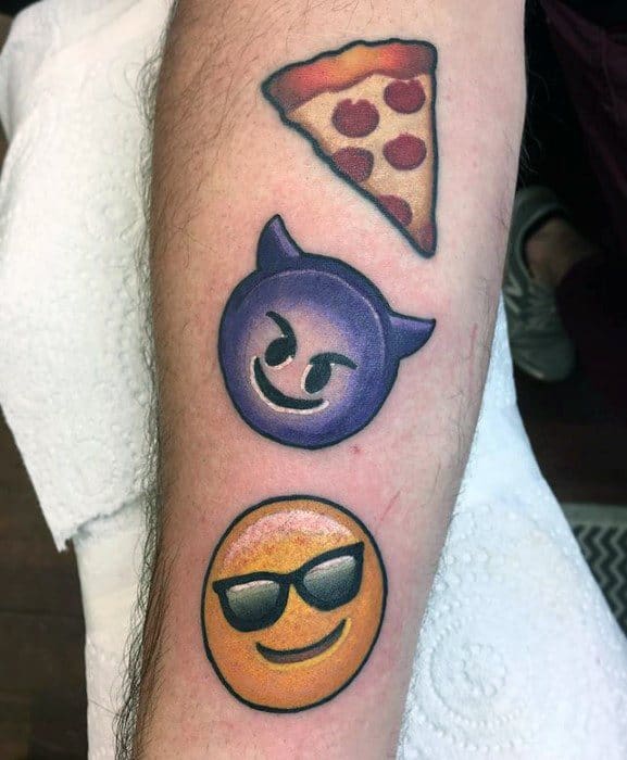 Arm tattoos of a pizza slice and emoji: the devil and cool sunglasses