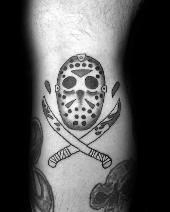 Gentleman With Jason Mask Tattoo On Leg
