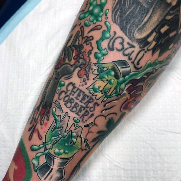 Vibrant tattoo of a shattered lava lamp with green wax splash, quirky and fun men's tattoo design.