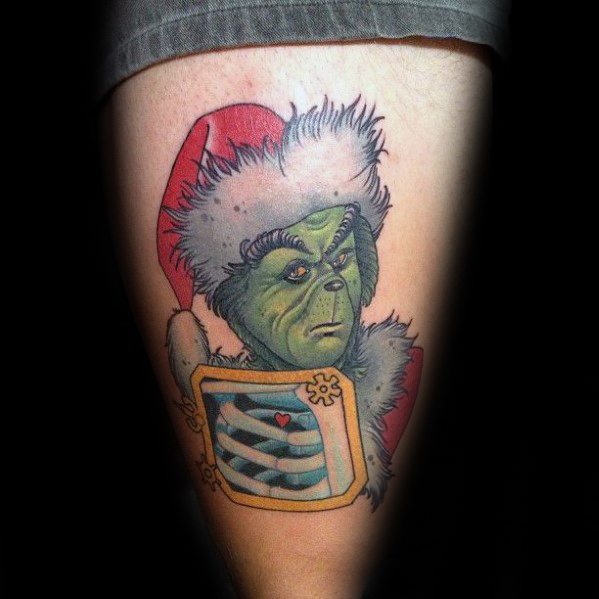 Grinch wearing a Santa hat and holding a small gift, with vibrant colors and playful details, creating a fun and festive tattoo design.