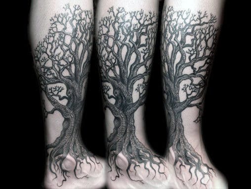 Gentleman With Lower Leg Tattoo Of Tree Roots