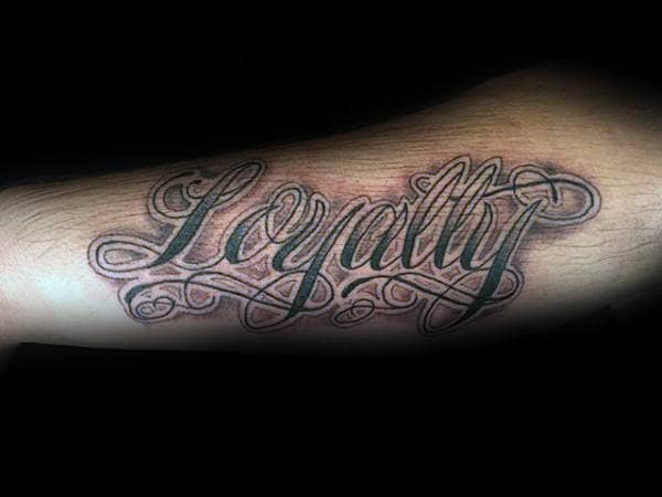 Gentleman With Loyalty Script Tattoo On Arm