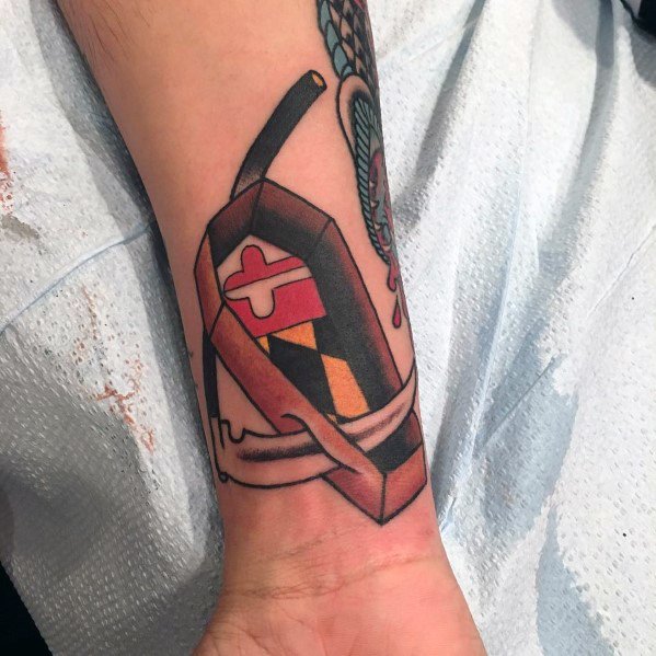 Maryland flag tattoo on the wrist with a unique 3D design, featuring a broken frame effect for a creative and eye-catching look.