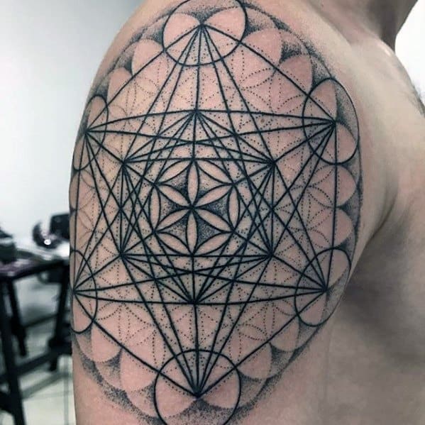 Shoulder tattoo of Metatron’s Cube with overlapping Flower of Life pattern and dotwork detailing, creating a harmonious sacred geometry design.