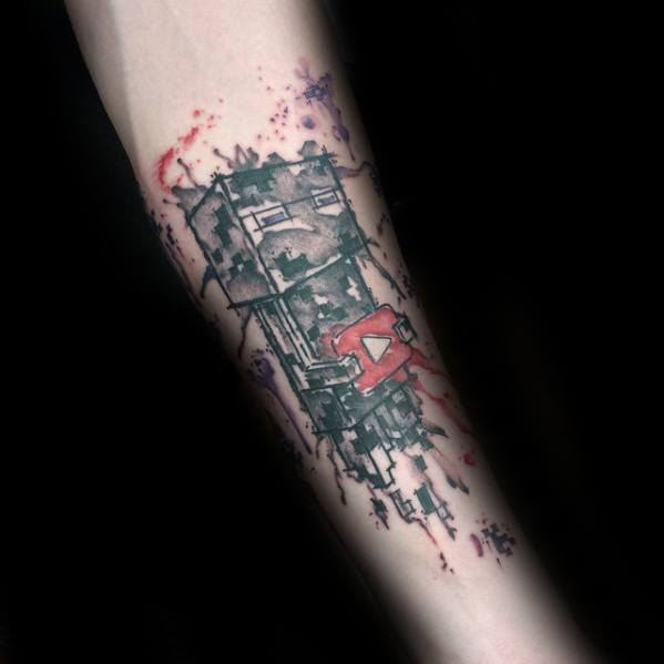 Abstract Minecraft Enderman tattoo on the forearm with glitch-style effects, red and purple ink splatters, and a striking red 'A' mark.