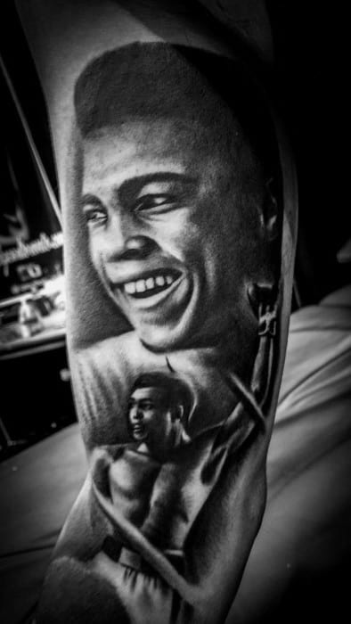 Gentleman With Muhammad Ali Tattoo On Arm