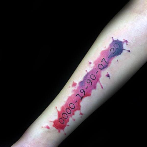 Gentleman With Numbers Typewriter Font And Watercolor Tattoo On Forearm