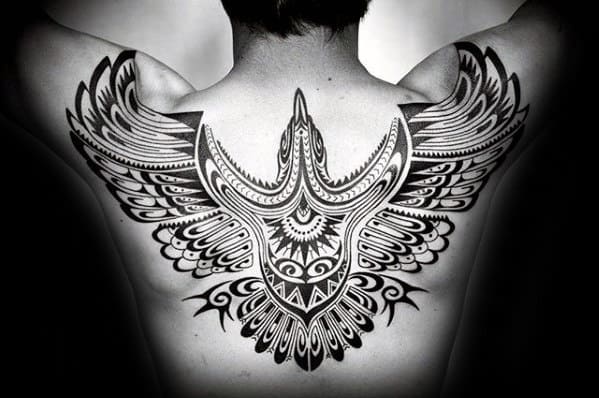 Gentleman With Ornate Tribal Bird Back Tattoo