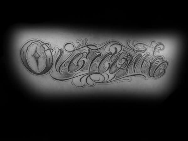 Gentleman With Overcome Tattoo On Back