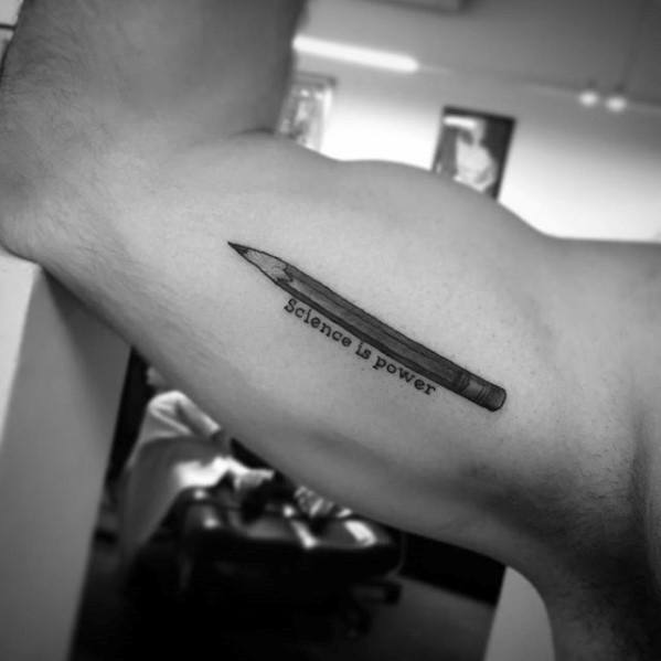 A sleek pencil tattoo adorns the bicep, inscribed with "Science is power," a testament to the strength in knowledge