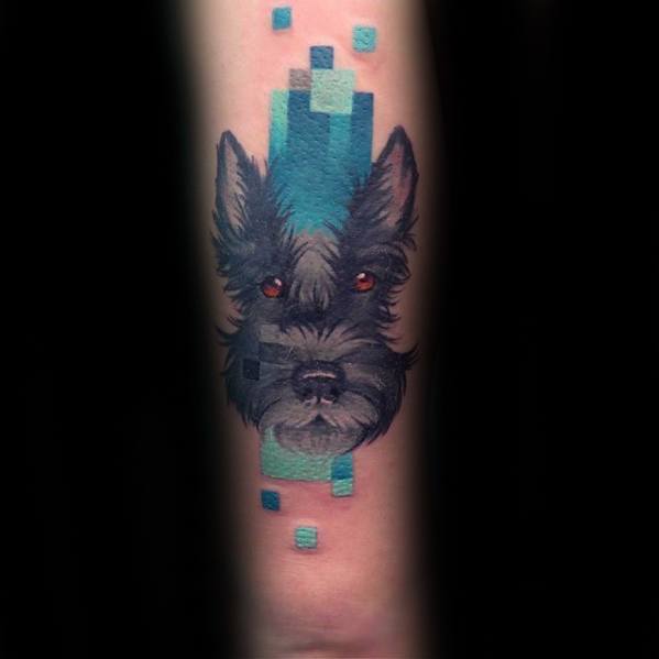 Gentleman With Pixel Dog Tattoo On Outer Arm