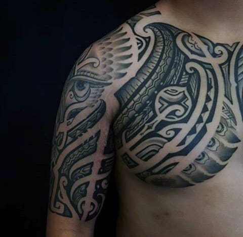 Gentleman With Polynesian Chest And Arm Tattoo