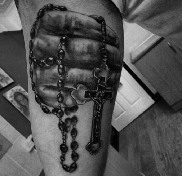 Gentleman With Praying Hands With Rosary Tattoo On Bicep Of Arm