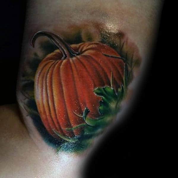 Gentleman With Realistic Pumpkin Arm Tattoo