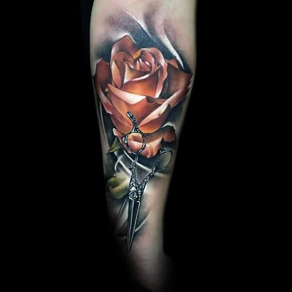 Gentleman With Realistic Red Rose Flower And Scissor Tattoo On Forearm