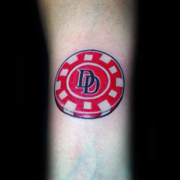 Gentleman With Red And White Ink Poker Chip Tattoo On Wrist