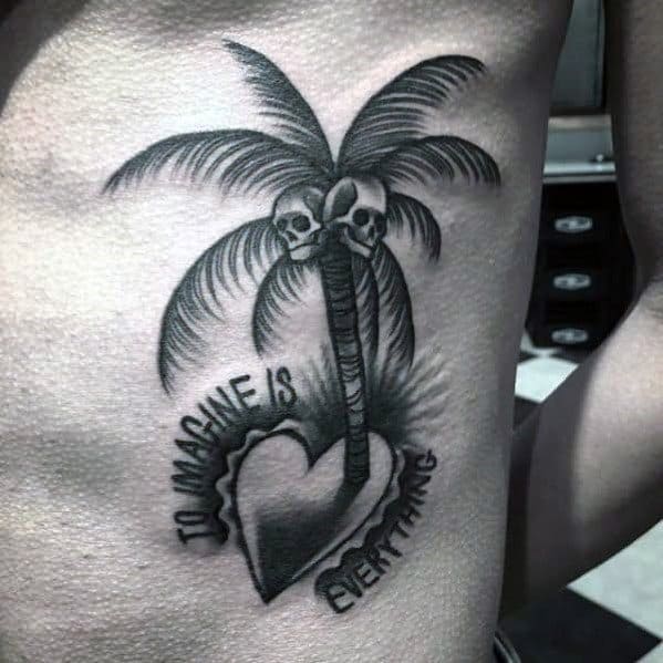 Palm tree tattoo with skull coconuts, a heart-shaped island, and the phrase "To imagine is everything" wrapping around the design.