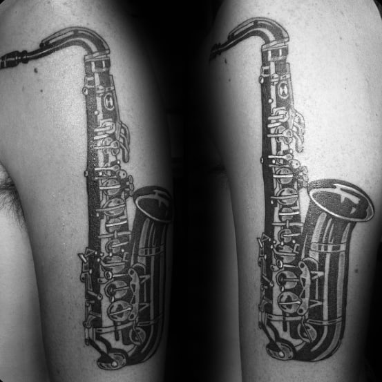 Gentleman With Saxophone Arm Tattoo