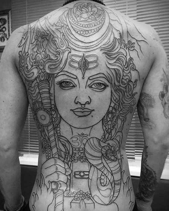 Large back tattoo outline of Lord Shiva with expressive eyes, holding a trident and cobra, featuring intricate detailing in hair and ornaments.